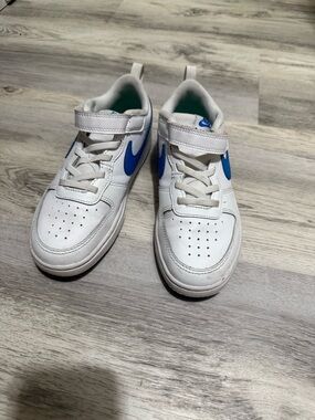 Nike Kids White Sneakers with Blue Swoosh